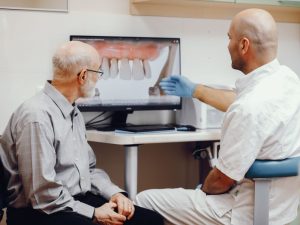 how soon can you get a dental implant after tooth extraction